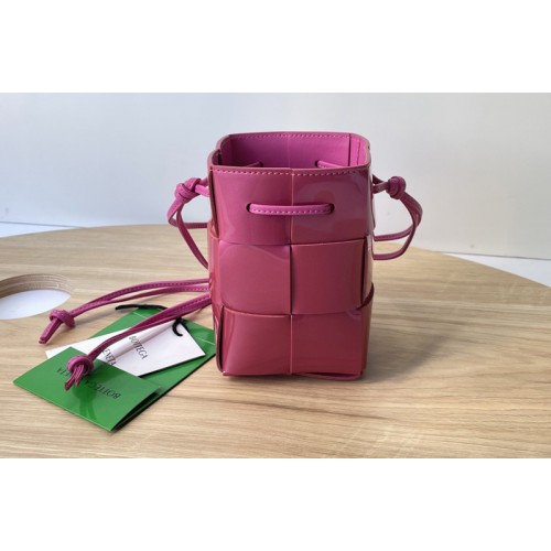Bottega Veneta Cassette Mini intreccio leather cross-body bucket bag in Azalea Leather